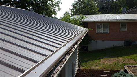 do houses with metal roofs need gutters|metal roof overhang into gutter.